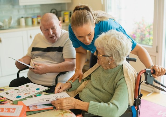 An adult daughter holding her aging parent's hand gently, illustrating family caregiving and support for chronic conditions