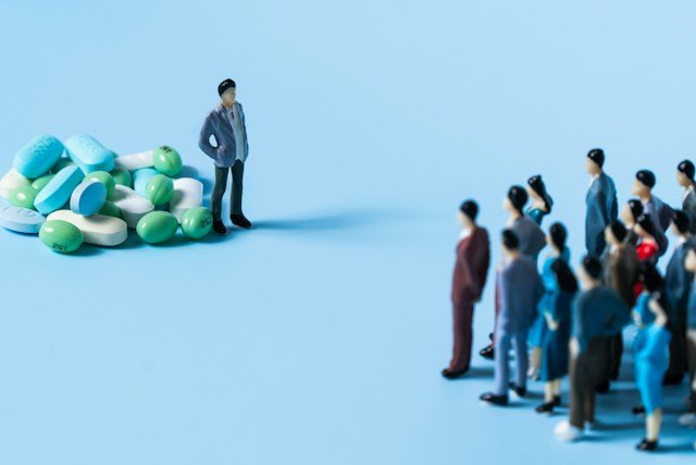 People talking and connecting together in a community setting to represent social health and wellbeing