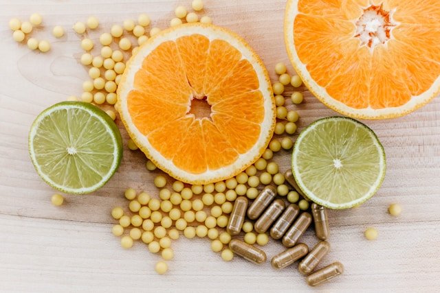 Fresh vegetables, legumes, nuts, seeds and other nutrient-rich foods arranged on a table
