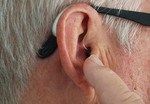 Senior woman having her eyes examined by an eye specialist to protect cognitive health