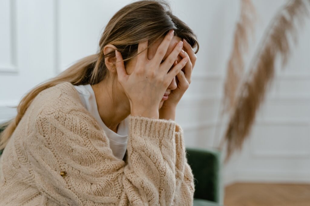 Healthcare professional explaining the relationship between cannabis, anxiety and brain health.