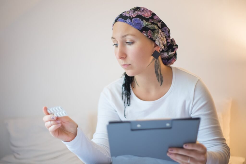 A healthcare professional discussing genomic testing and personalized treatment options with a woman diagnosed with breast cancer.