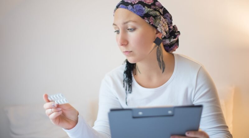 A healthcare professional discussing genomic testing and personalized treatment options with a woman diagnosed with breast cancer.